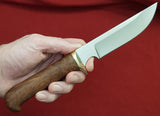 # B-001. Hunting knife. 5.5". D2. 62 HRC. Bronze. Stabilized Rosewood.