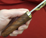 # B-001. Hunting knife. 5.5". D2. 62 HRC. Bronze. Stabilized Rosewood.