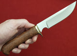 # B-001. Hunting knife. 5.5". D2. 62 HRC. Bronze. Stabilized Rosewood.