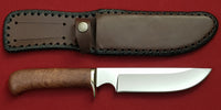 # B-002. Hunting knife. 6.3". D2. 62 HRC. Bronze. Stabilized Rosewood.