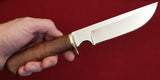 # B-002. Hunting knife. 6.3". D2. 62 HRC. Bronze. Stabilized Rosewood.