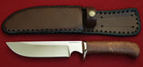 # B-002. Hunting knife. 6.3". D2. 62 HRC. Bronze. Stabilized Rosewood.