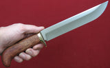 # B-010. Hunting knife. 8.3". D2. 62 HRC. Bronze. Bubinga.