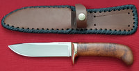 # B-012. Hunting knife. 5.0". D2. 62 HRC. Bronze. Roasted Bird's Eye Maple.