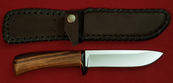 # B-023. Hunting knife. 5.3". D2. 62 HRC. G-10 Guard. Walnut Wood Handle.